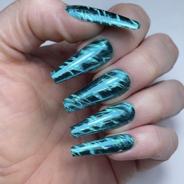 turquoise waves foil on hands